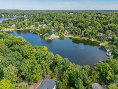 Enjoy lake living in the sought-after Lake Doster community on Lake Doster Golf Club in Michigan - for sale on GolfHomes.com, golf home, golf lot
