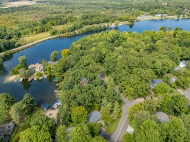 Enjoy lake living in the sought-after Lake Doster community on Lake Doster Golf Club in Michigan - for sale on GolfHomes.com, golf home, golf lot