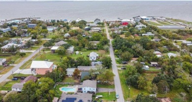 236 3rd St, San Leon, TX, is just two streets from the bay on Chapparral Rec Assoc Golf Club in Texas - for sale on GolfHomes.com, golf home, golf lot