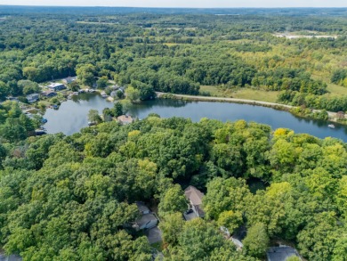Enjoy lake living in the sought-after Lake Doster community on Lake Doster Golf Club in Michigan - for sale on GolfHomes.com, golf home, golf lot