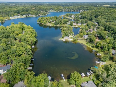 Enjoy lake living in the sought-after Lake Doster community on Lake Doster Golf Club in Michigan - for sale on GolfHomes.com, golf home, golf lot