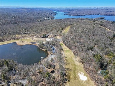 Unbeatable location nestled directly between the tranquil shores on Paupack Hills Golf and Country Club in Pennsylvania - for sale on GolfHomes.com, golf home, golf lot