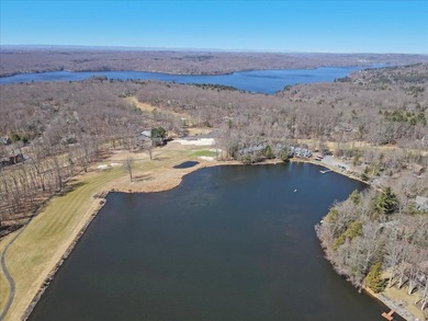 Unbeatable location nestled directly between the tranquil shores on Paupack Hills Golf and Country Club in Pennsylvania - for sale on GolfHomes.com, golf home, golf lot