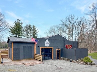 Unbeatable location nestled directly between the tranquil shores on Paupack Hills Golf and Country Club in Pennsylvania - for sale on GolfHomes.com, golf home, golf lot