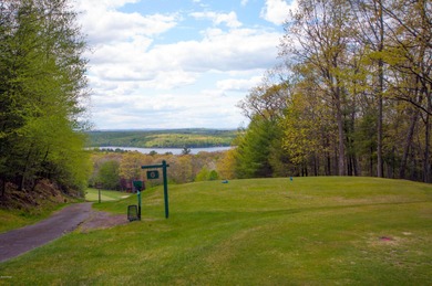 Unbeatable location nestled directly between the tranquil shores on Paupack Hills Golf and Country Club in Pennsylvania - for sale on GolfHomes.com, golf home, golf lot
