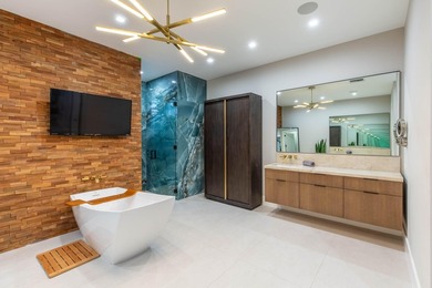 Luxury oasis in prestigious Breakers West Golf & Country Club on Breakers Rees Jones Course in Florida - for sale on GolfHomes.com, golf home, golf lot