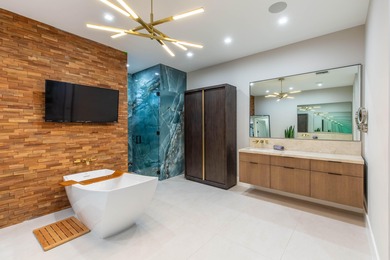 Luxury oasis in prestigious Breakers West Golf & Country Club on Breakers Rees Jones Course in Florida - for sale on GolfHomes.com, golf home, golf lot