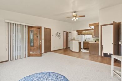 Welcome to effortless living in this beautifully maintained on Saddle Ridge Golf Club in Wisconsin - for sale on GolfHomes.com, golf home, golf lot