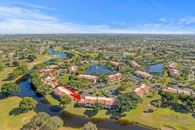 GORGEOUS WATERFRONT CONDO | COMPLETELY REMODELED | FIRST FLOOR on Boca Lago Golf and Country Club in Florida - for sale on GolfHomes.com, golf home, golf lot