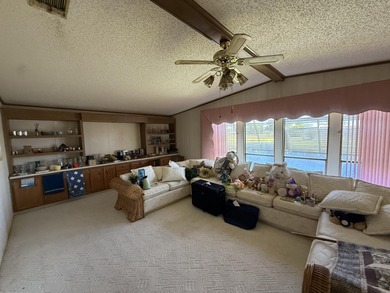 Enjoy waterfront living LAND OWNED in the highly sought-after on Savanna Golf Club in Florida - for sale on GolfHomes.com, golf home, golf lot