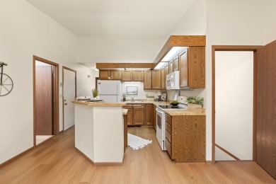 Welcome to effortless living in this beautifully maintained on Saddle Ridge Golf Club in Wisconsin - for sale on GolfHomes.com, golf home, golf lot