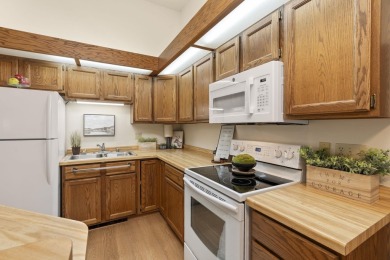 Welcome to effortless living in this beautifully maintained on Saddle Ridge Golf Club in Wisconsin - for sale on GolfHomes.com, golf home, golf lot