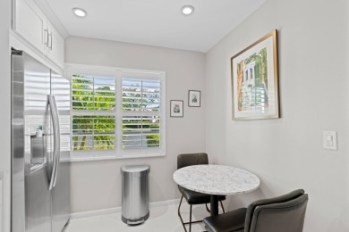 GORGEOUS WATERFRONT CONDO | COMPLETELY REMODELED | FIRST FLOOR on Boca Lago Golf and Country Club in Florida - for sale on GolfHomes.com, golf home, golf lot