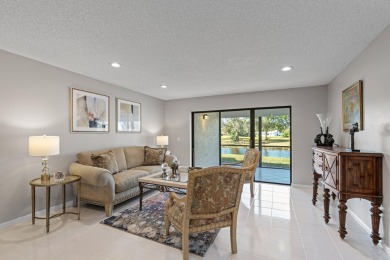 GORGEOUS WATERFRONT CONDO | COMPLETELY REMODELED | FIRST FLOOR on Boca Lago Golf and Country Club in Florida - for sale on GolfHomes.com, golf home, golf lot