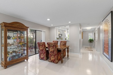GORGEOUS WATERFRONT CONDO | COMPLETELY REMODELED | FIRST FLOOR on Boca Lago Golf and Country Club in Florida - for sale on GolfHomes.com, golf home, golf lot