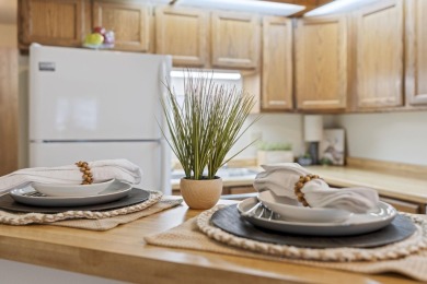 Welcome to effortless living in this beautifully maintained on Saddle Ridge Golf Club in Wisconsin - for sale on GolfHomes.com, golf home, golf lot