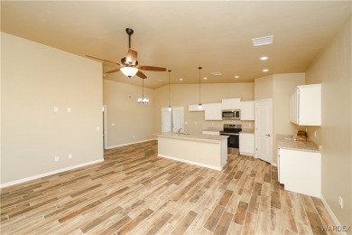 Nestled within the serene landscape of a golf course subdivision on Valle Vista Golf Course in Arizona - for sale on GolfHomes.com, golf home, golf lot