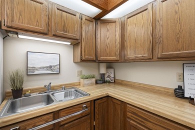 Welcome to effortless living in this beautifully maintained on Saddle Ridge Golf Club in Wisconsin - for sale on GolfHomes.com, golf home, golf lot