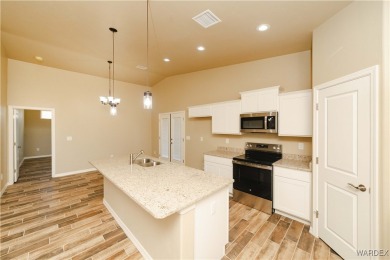 Nestled within the serene landscape of a golf course subdivision on Valle Vista Golf Course in Arizona - for sale on GolfHomes.com, golf home, golf lot