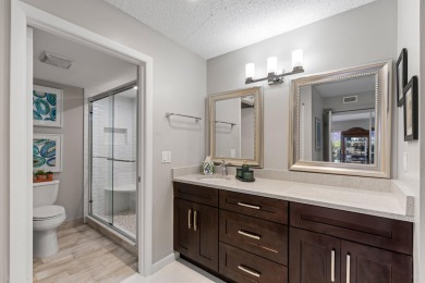 GORGEOUS WATERFRONT CONDO | COMPLETELY REMODELED | FIRST FLOOR on Boca Lago Golf and Country Club in Florida - for sale on GolfHomes.com, golf home, golf lot