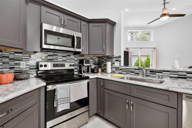 Updated 3BDRM/3BA Courtyard model home in the much sought after on Westchester Golf and Country Club in Florida - for sale on GolfHomes.com, golf home, golf lot