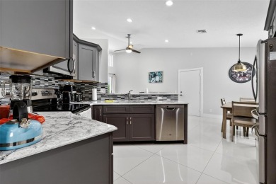 Updated 3BDRM/3BA Courtyard model home in the much sought after on Westchester Golf and Country Club in Florida - for sale on GolfHomes.com, golf home, golf lot
