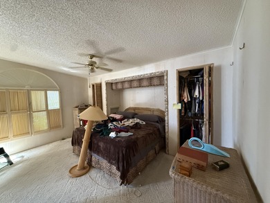 Enjoy waterfront living LAND OWNED in the highly sought-after on Savanna Golf Club in Florida - for sale on GolfHomes.com, golf home, golf lot