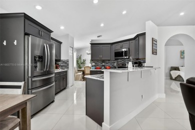 Updated 3BDRM/3BA Courtyard model home in the much sought after on Westchester Golf and Country Club in Florida - for sale on GolfHomes.com, golf home, golf lot