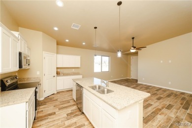 Nestled within the serene landscape of a golf course subdivision on Valle Vista Golf Course in Arizona - for sale on GolfHomes.com, golf home, golf lot