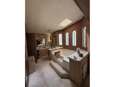 Enjoy waterfront living LAND OWNED in the highly sought-after on Savanna Golf Club in Florida - for sale on GolfHomes.com, golf home, golf lot