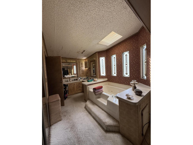 Enjoy waterfront living LAND OWNED in the highly sought-after on Savanna Golf Club in Florida - for sale on GolfHomes.com, golf home, golf lot