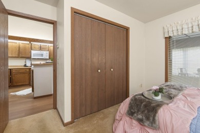 Welcome to effortless living in this beautifully maintained on Saddle Ridge Golf Club in Wisconsin - for sale on GolfHomes.com, golf home, golf lot