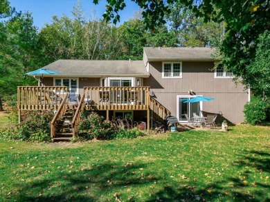 This spacious quad-level home is nestled on a double wooded lot on Savannah Oaks Golf Club of Candlewick Lake in Illinois - for sale on GolfHomes.com, golf home, golf lot