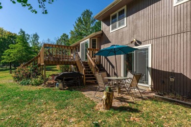 This spacious quad-level home is nestled on a double wooded lot on Savannah Oaks Golf Club of Candlewick Lake in Illinois - for sale on GolfHomes.com, golf home, golf lot