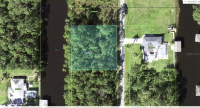 Come build your forever home on this one-half acre CANAL lot on Indian Lake Estates Golf and Country Club in Florida - for sale on GolfHomes.com, golf home, golf lot