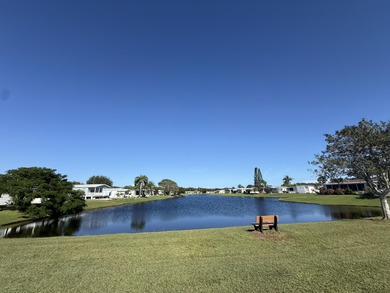 Enjoy waterfront living LAND OWNED in the highly sought-after on Savanna Golf Club in Florida - for sale on GolfHomes.com, golf home, golf lot