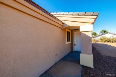 Nestled within the serene landscape of a golf course subdivision on Valle Vista Golf Course in Arizona - for sale on GolfHomes.com, golf home, golf lot