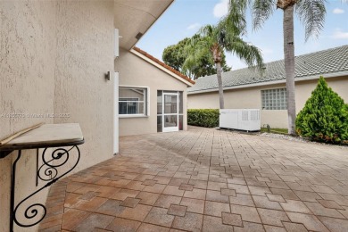 Updated 3BDRM/3BA Courtyard model home in the much sought after on Westchester Golf and Country Club in Florida - for sale on GolfHomes.com, golf home, golf lot