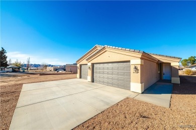 Nestled within the serene landscape of a golf course subdivision on Valle Vista Golf Course in Arizona - for sale on GolfHomes.com, golf home, golf lot