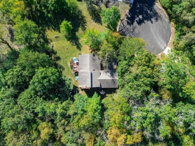 This spacious quad-level home is nestled on a double wooded lot on Savannah Oaks Golf Club of Candlewick Lake in Illinois - for sale on GolfHomes.com, golf home, golf lot