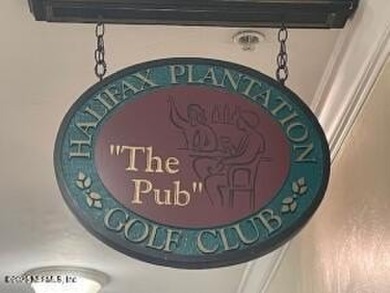Beautiful home with 3 bedrooms, 2 full baths, 3rd bedroom on Halifax Plantation Golf Club in Florida - for sale on GolfHomes.com, golf home, golf lot