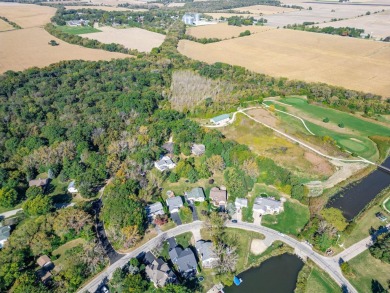 This spacious quad-level home is nestled on a double wooded lot on Savannah Oaks Golf Club of Candlewick Lake in Illinois - for sale on GolfHomes.com, golf home, golf lot