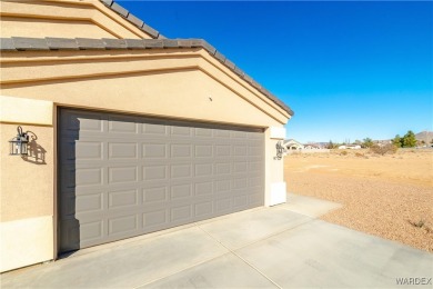Nestled within the serene landscape of a golf course subdivision on Valle Vista Golf Course in Arizona - for sale on GolfHomes.com, golf home, golf lot