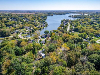 This spacious quad-level home is nestled on a double wooded lot on Savannah Oaks Golf Club of Candlewick Lake in Illinois - for sale on GolfHomes.com, golf home, golf lot