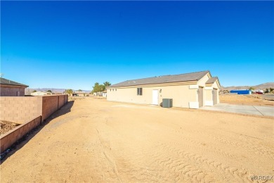 Nestled within the serene landscape of a golf course subdivision on Valle Vista Golf Course in Arizona - for sale on GolfHomes.com, golf home, golf lot