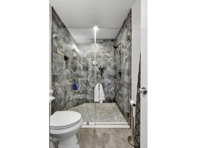 Updated 3BDRM/3BA Courtyard model home in the much sought after on Westchester Golf and Country Club in Florida - for sale on GolfHomes.com, golf home, golf lot