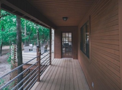 Welcome to this charming home nestled within the private, gated on Holly Lake Ranch Golf Club in Texas - for sale on GolfHomes.com, golf home, golf lot