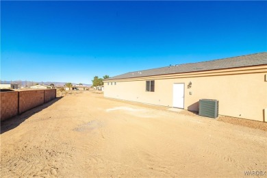 Nestled within the serene landscape of a golf course subdivision on Valle Vista Golf Course in Arizona - for sale on GolfHomes.com, golf home, golf lot