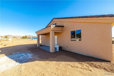 Nestled within the serene landscape of a golf course subdivision on Valle Vista Golf Course in Arizona - for sale on GolfHomes.com, golf home, golf lot