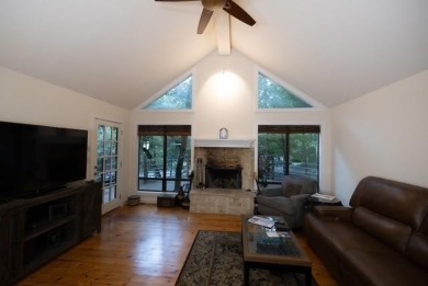 Welcome to this charming home nestled within the private, gated on Holly Lake Ranch Golf Club in Texas - for sale on GolfHomes.com, golf home, golf lot